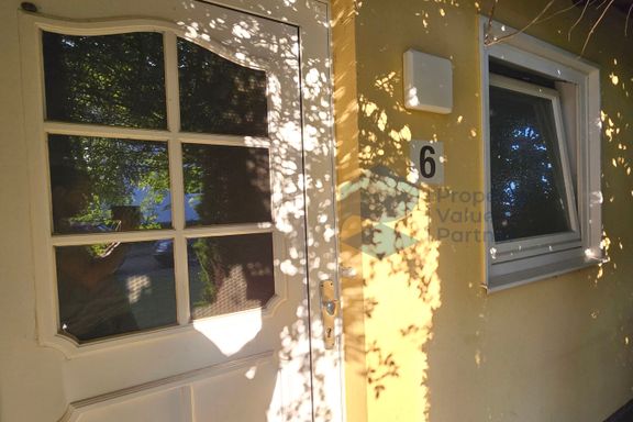 Kleiner Reihenbungalow mit Terrasse und tollem Gartenblick